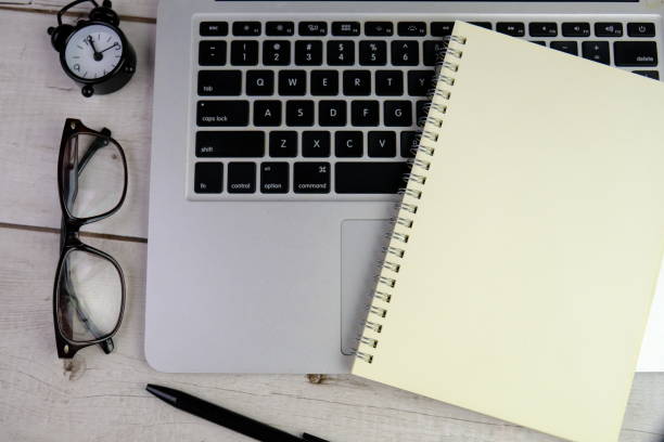 flat lay of a blank note book for text space. Educational concept with text space on isolated background.