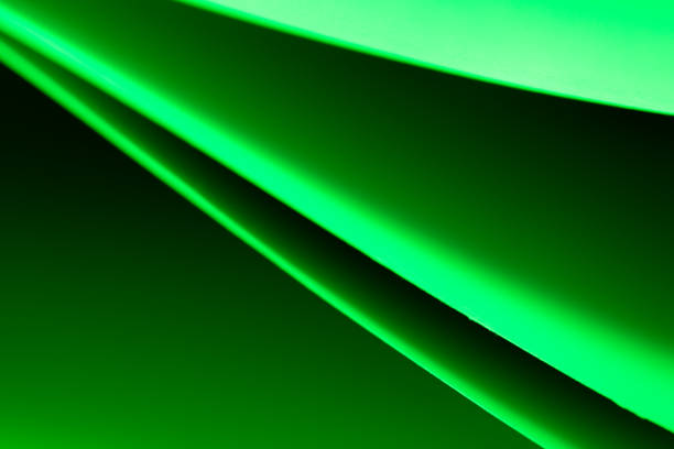 istock Colorful abstract curves in shades of green and black creating a dynamic visual experience 2191245773