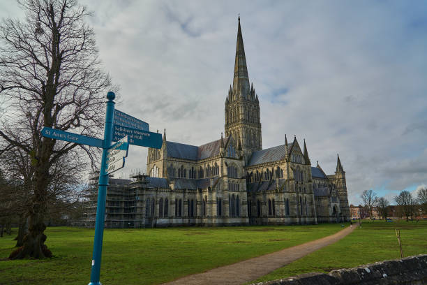 tall Salisbury Cathedral, formally known as the Cathedral Church of the Blessed Virgin Mary, an Anglican cathedral in Salisbury, England, popular travel destination in great britain, united kingdom.