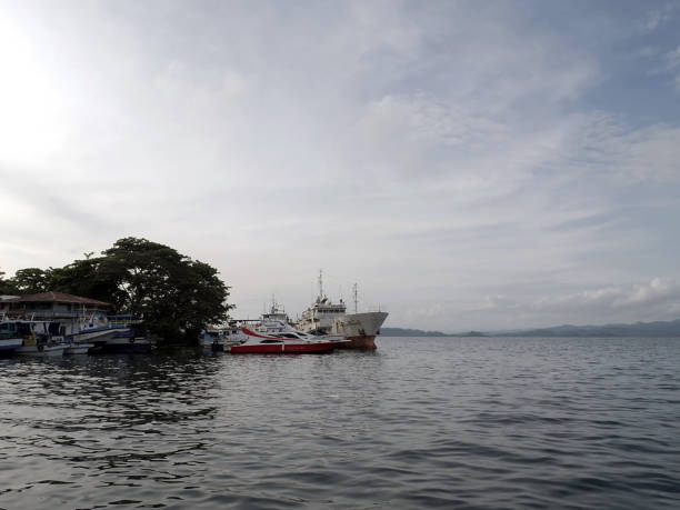 istock fishing boats docked on a beach 2191251470