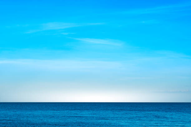 istock Beach sand background for summer vacation concept. Beach nature and summer seawater with sunlight light sandy beach Sparkling sea water contrast with the blue sky. 2191255257