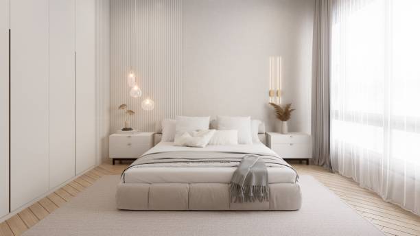 istock A modern, minimalist bedroom featuring a large bed, soft textiles, and natural light streaming through sheer curtains. 2191257240