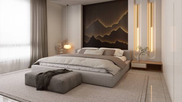 istock A modern, elegantly designed bedroom featuring a plush bed, ambient lighting, and stylish decor, creating a serene and inviting atmosphere. 3d rendering. 2191257801