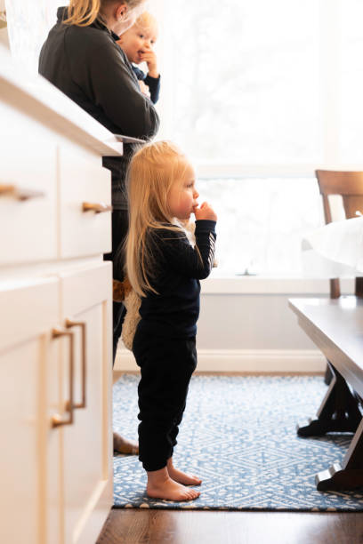 istock Toddler sucking her thumb at home 2191262298