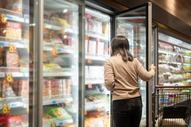 istock asian female shopping in ice shelf 2191263842