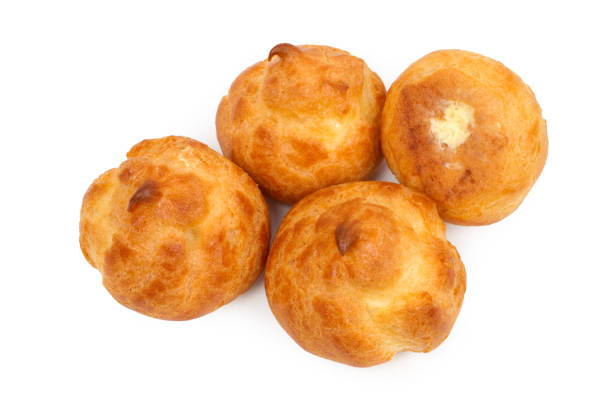 istock Profiteroles with buttercream on a white background. 2191265533