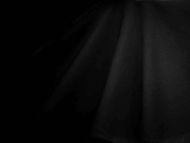 istock Curtain or fabric black wave. Luxury abstract background in isolated and copy space. 2191266780
