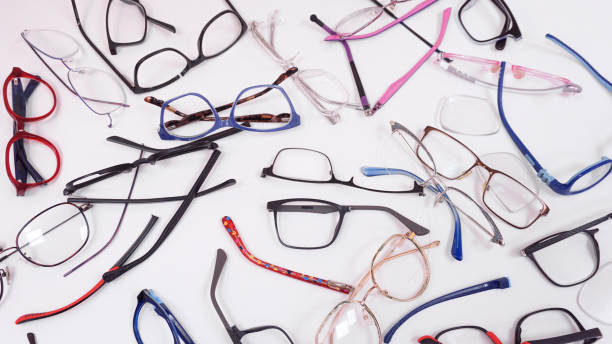 istock Assortment of broken optical eyeglasses, broken hinges, missing lenses 2191267253