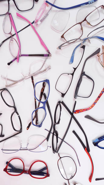 istock Assortment of broken optical eyeglasses, broken hinges, missing lenses 2191267336