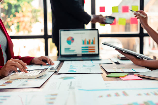 istock Documents and hands on table in conference room in business presentation or seminar Multiethnic group of people working with documents on table in conference room in business presentation or seminar. 2191268574