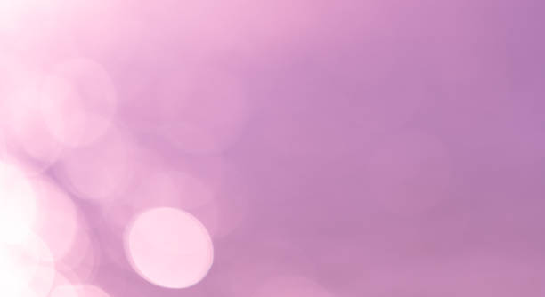 istock Purple ball bokeh background 2191270404