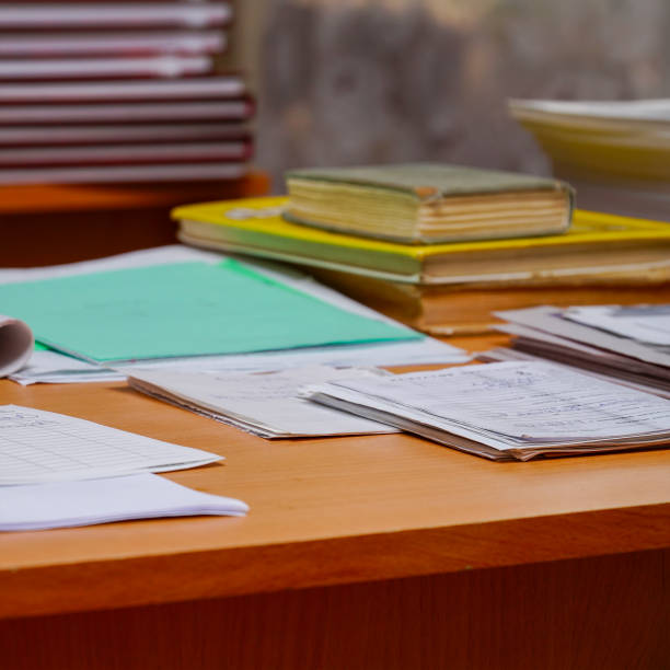 istock Books and office supplies on the table 2191270861