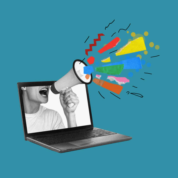 istock Young man inside laptop screen emotionally shouting in megaphone with abstract colorful exclamation marks. News, announcement, propaganda 2191274227