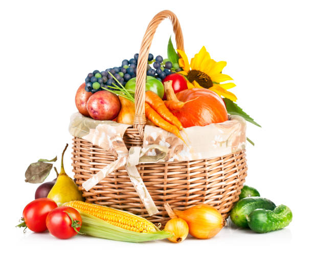 istock autumnal harvest vegetable and fruit in basket isolated on 2191274273