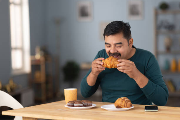 istock Indian Man having breakfast at home stock photo 2191275449