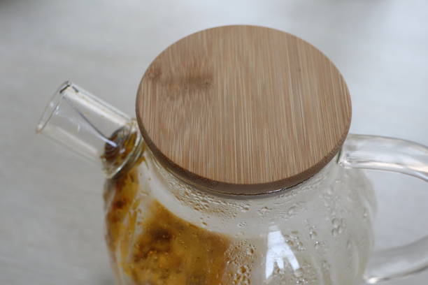 istock An Elegant Glass Teapot featuring a Stylish Wooden Lid, Perfect for Devoted Tea Lovers 2191277169