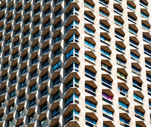 istock Concrete facade of a building with multiple similar windows 2191277845