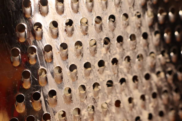 istock This is a CloseUp of a Grater Surface featuring multiple holes that serve a purpose 2191278008