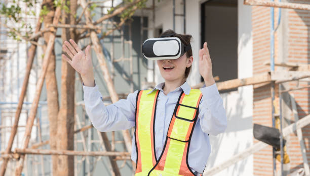 istock Woman engineer construction using virtual reality headset at construction site. Foreman woman construction working and wearing virtual reality headset for inspecting at work 2191281271