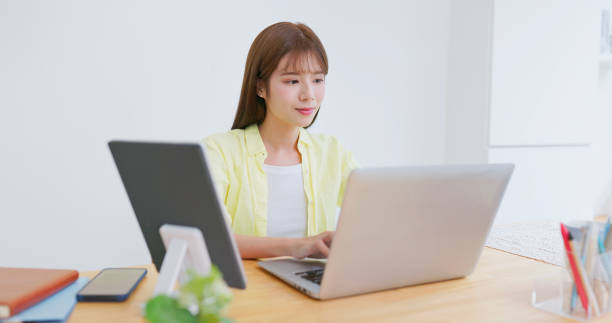 istock asian woman office laptop typing 2191281288