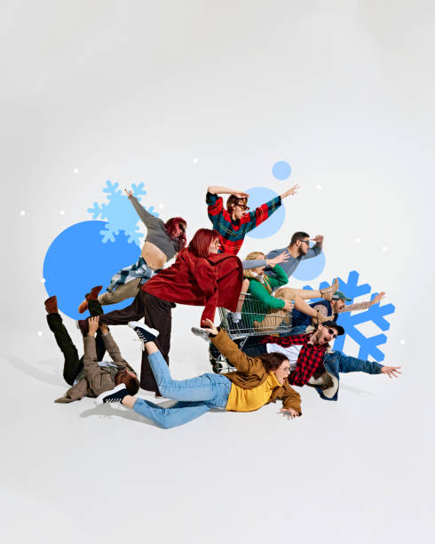 istock Dynamic group of people falling and reaching towards discounts, symbolizing enthusiasm and rush for winter sales. 2191281520
