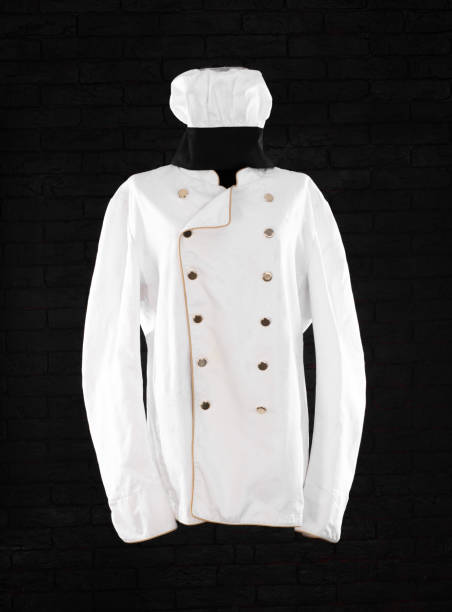 istock white chef uniform on mannequin isolated on black background 2191285146