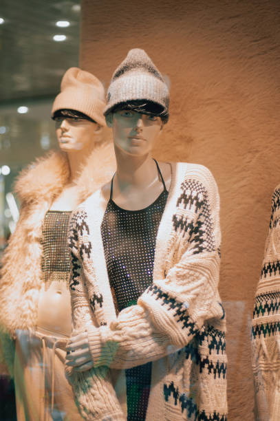 istock Female Mannequin in Knitted Winter Clothes on Display 2191286618