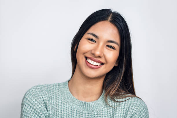 istock Beautiful happy woman smiling while looking at camera 2191287025