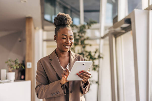 istock Successful black woman working on digital tablet 2191288635