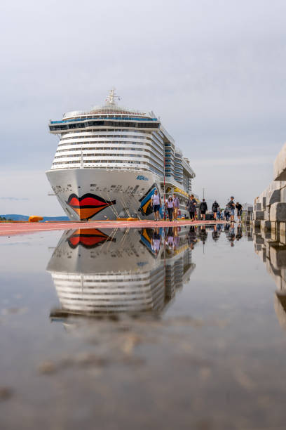 Oslo, Norway - July 29, 2024: AIDA Cruises AIDAnova docked at the harbor in Oslo. The boat is owned by AIDA Cruises.  \nIMO number: 9781865