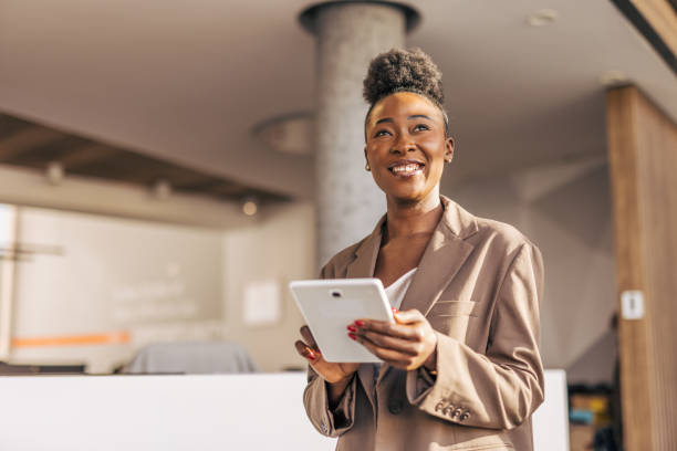 istock Successful black woman working on digital tablet 2191289053