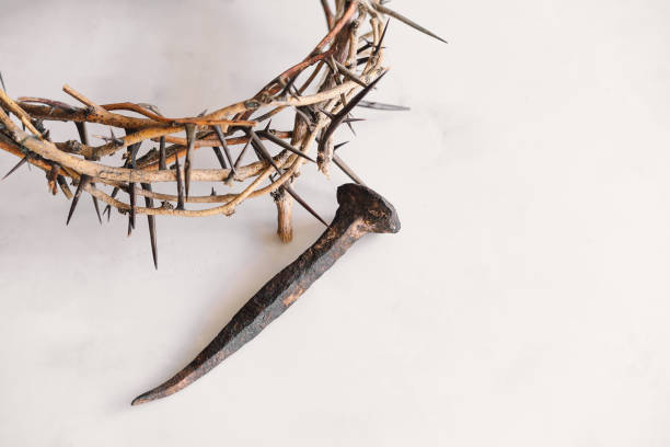 istock Jesus Crown Thorns and nails and cross on a white background. 2191290253