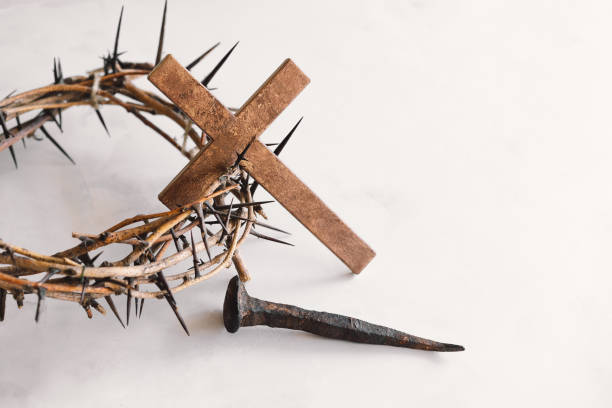 istock Jesus Crown Thorns and nails and cross on a white background. 2191290310
