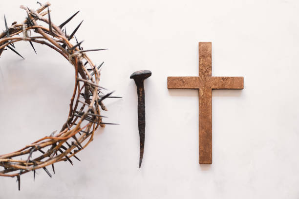 istock Jesus Crown Thorns and nails and cross on a white background. 2191290359