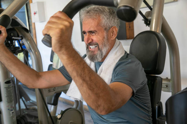 istock Active Senior Man Exercising in the Gym 2191290715