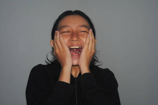 Facial expressions of Indonesian teenage girl.