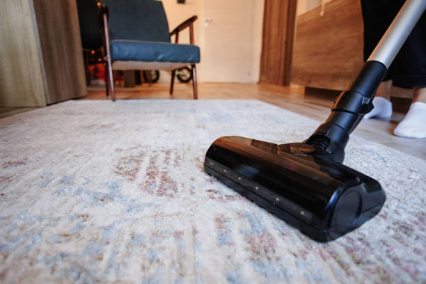 istock Vacuum Cleaning Home Carpet With Modern Cordless Sweeper 2191292975
