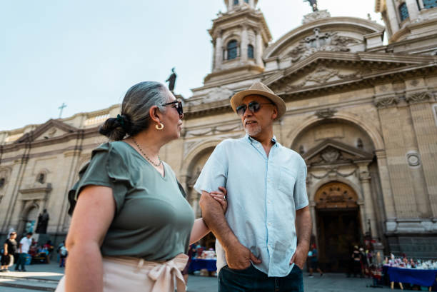 istock Couple talking and walking in Santiago, Chile 2191295515