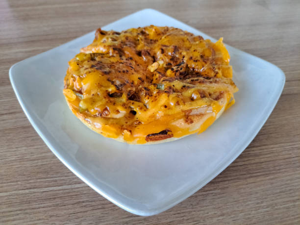 Tasty Pizza Tender Beef Triumph With Pulled Beef, Onion, Green Peppers, Mozzarella Cheese, Cheddar Cheese, BBQ Sauce And Honey Mustard Sauce. Food Menu.