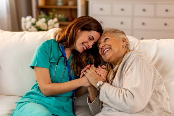 istock Smiling Caregiver Spending Quality Time With a Senior Patient at Home 2191305748
