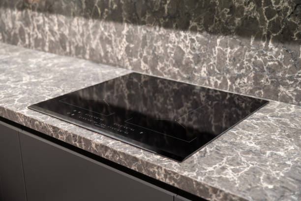 istock Modern black glass induction cooker on kitchen 2191306858