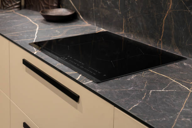 istock Modern black glass induction cooker on kitchen 2191306861