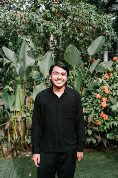 istock A Southeast Asian man smiling warmly while looking straight ahead, 2191308677