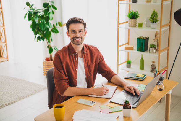 istock Young man at a home office workspace smiling with confidence 2191310703