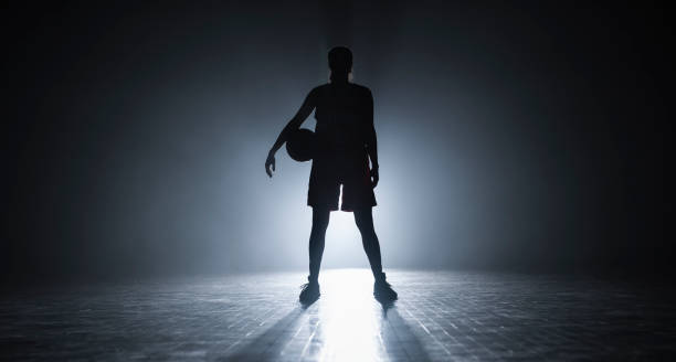 istock Female Basketball Player Silhouette Training 2191319606