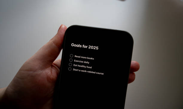 istock A list of 2025 goals displayed on a smartphone. Representing New Year resolutions, goal setting, and planning for success in the upcoming year. A concept of personal growth and motivation 2191320105