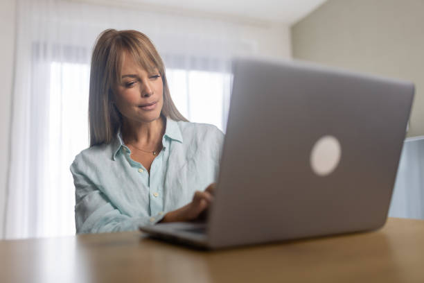 istock Woman working on laptop at home 2191320214
