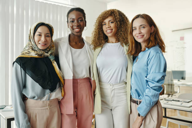 istock Smiling Women Posing Together in Office 2191320630