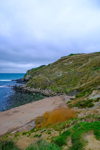istock Lulworth Cove and beach view at winter day 2191321430