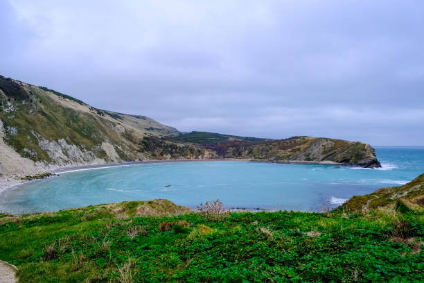 istock Lulworth Cove and beach view at winter day 2191321499